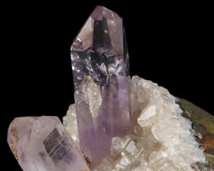 Amethyst with fluid/bubble inclusion